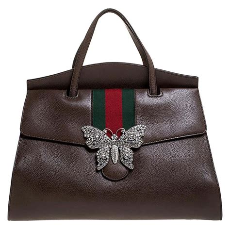 gucci butterfly purse|gucci bag with butterfly buckle.